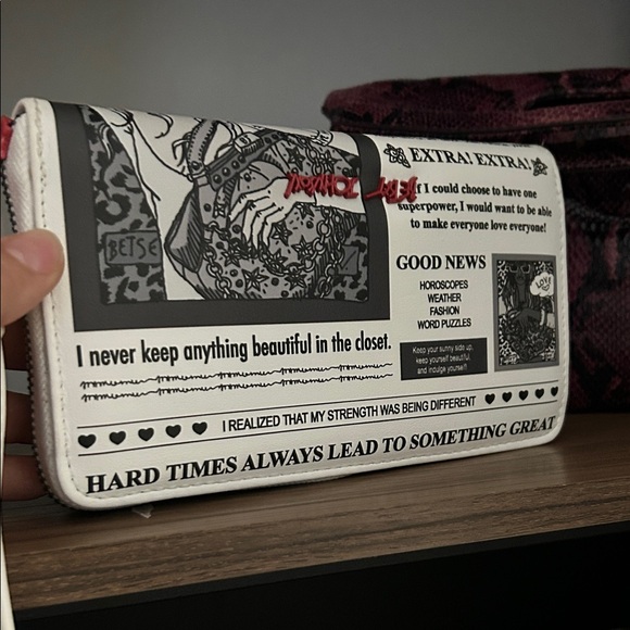 Betsey Johnson Handbags - Betsey Johnson Sexy White Newspaper Print Zip Clutch with Black and Red Details